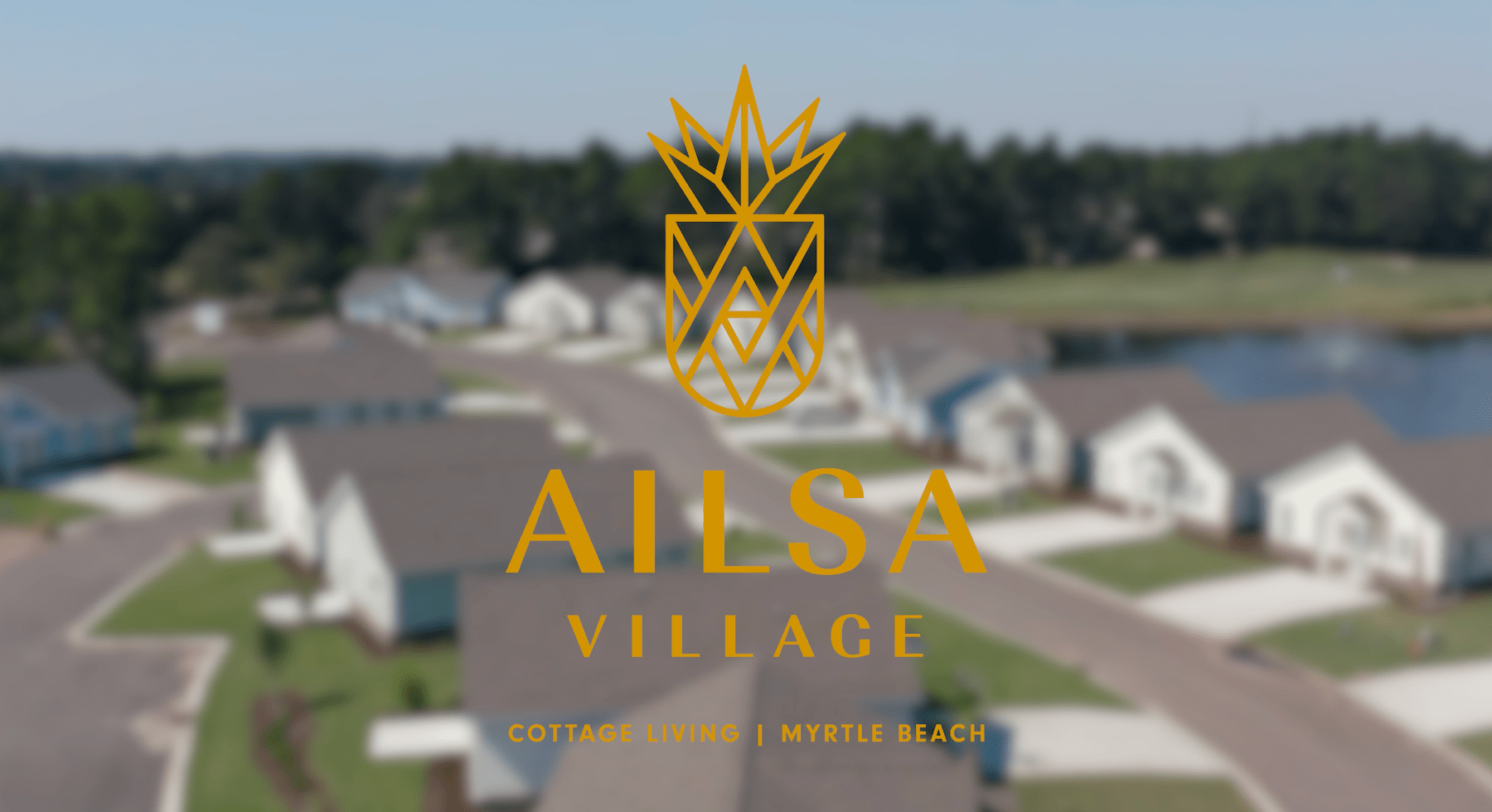 aerial of Ailsa Village with logo overlay
